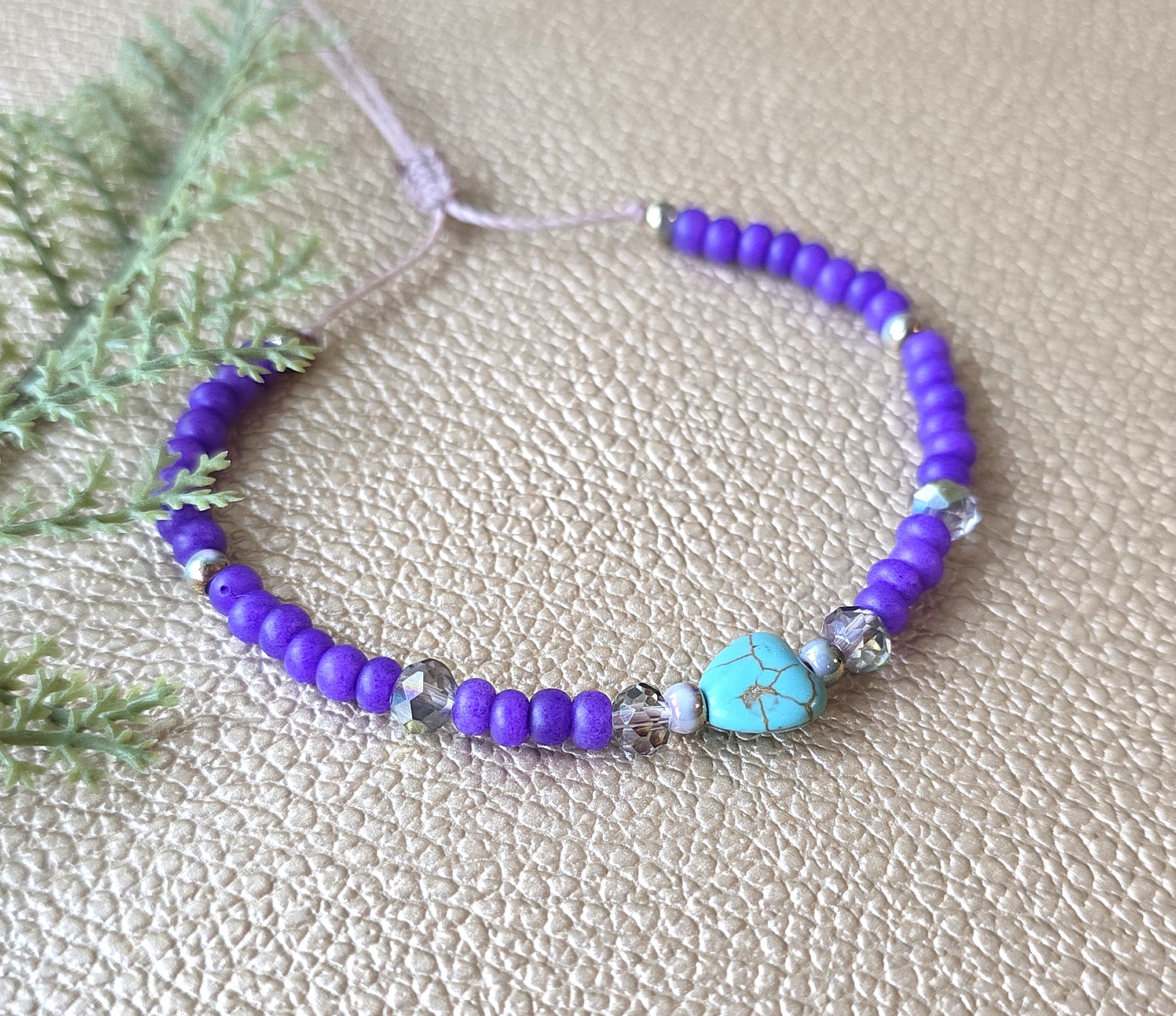 Lilla käevõru türkiisiga